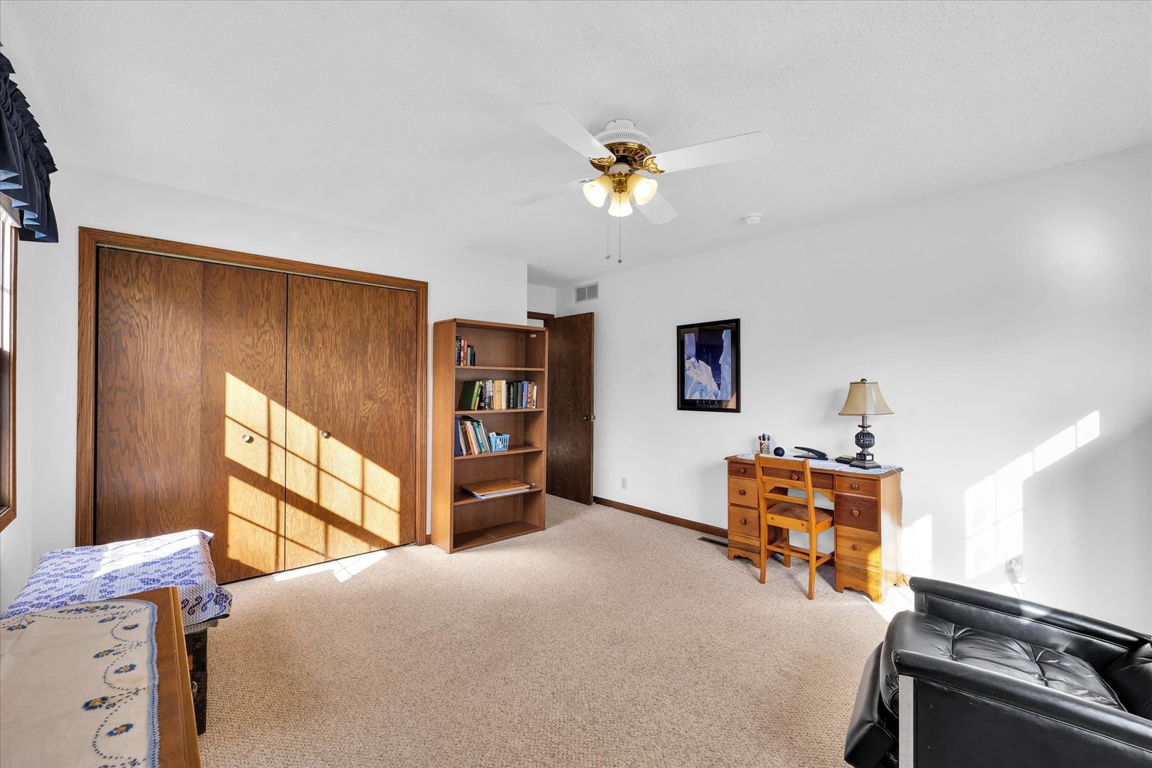 2011 O Donnell Drive Champaign, IL 61821 - Photo 38 of 43 a bedroom with furniture and a window