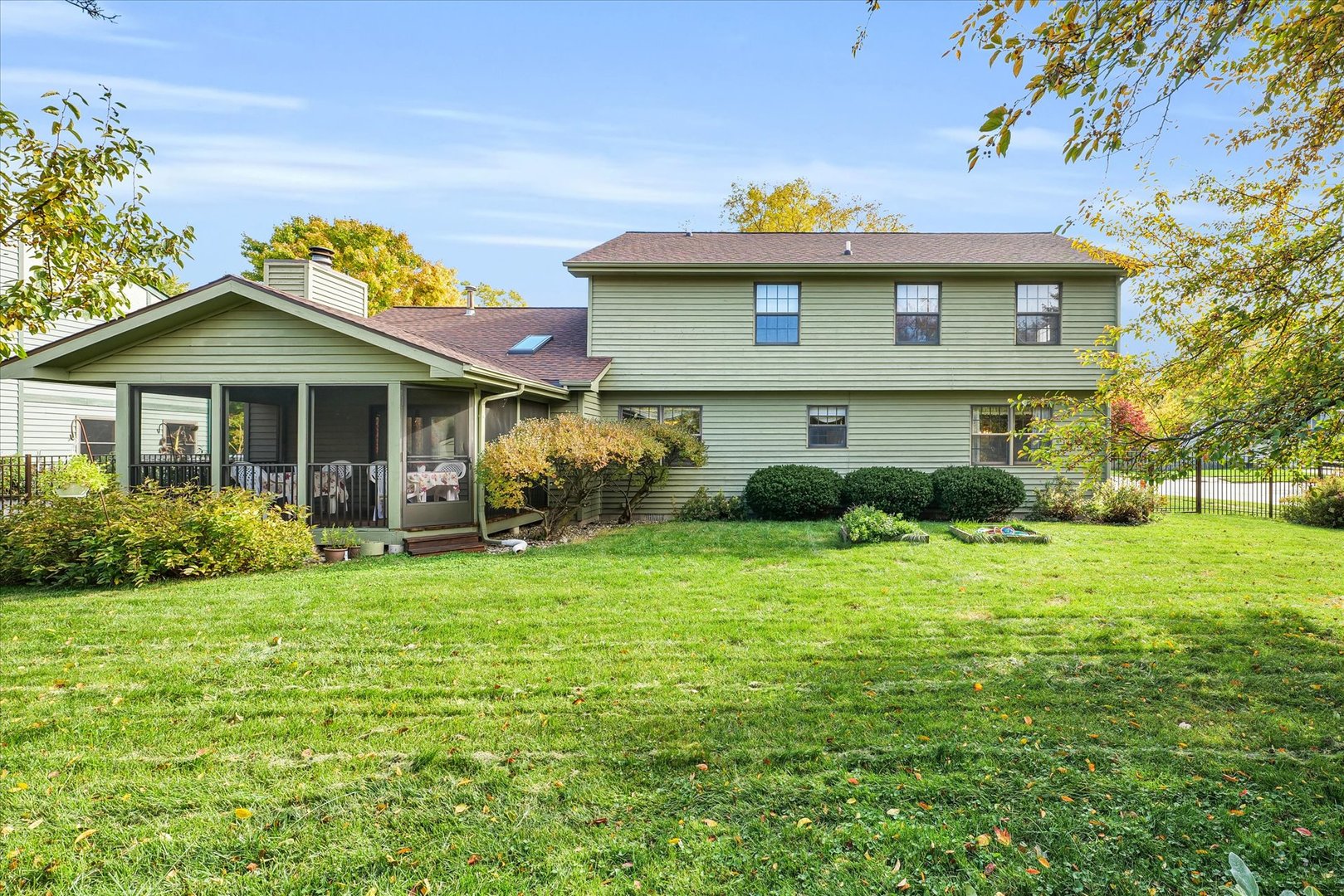 2011 O Donnell Drive Champaign, IL 61821 - Photo 40 of 43 a front view of a house with garden