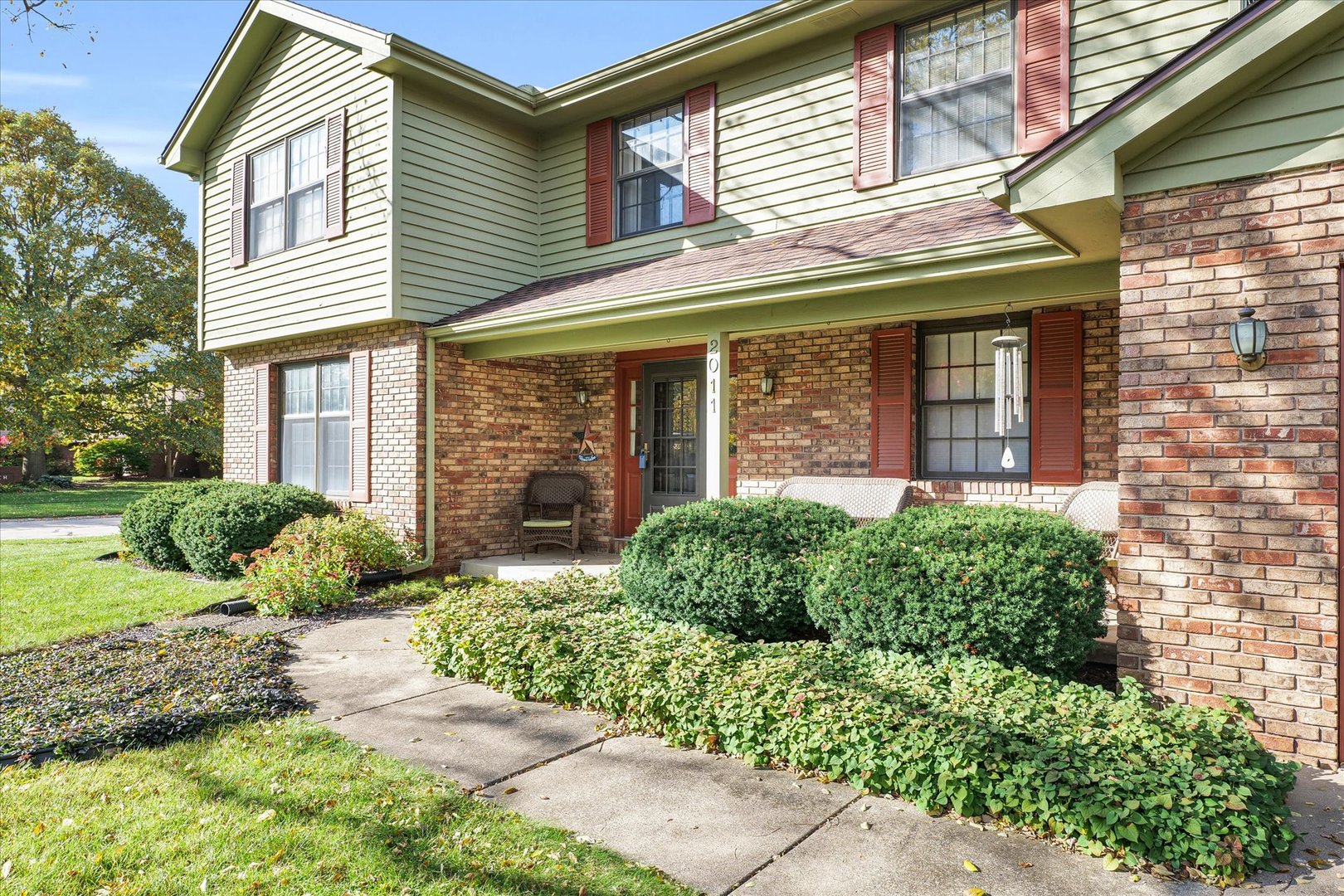 2011 O Donnell Drive Champaign, IL 61821 - Photo 5 of 43 a front view of a house with garden