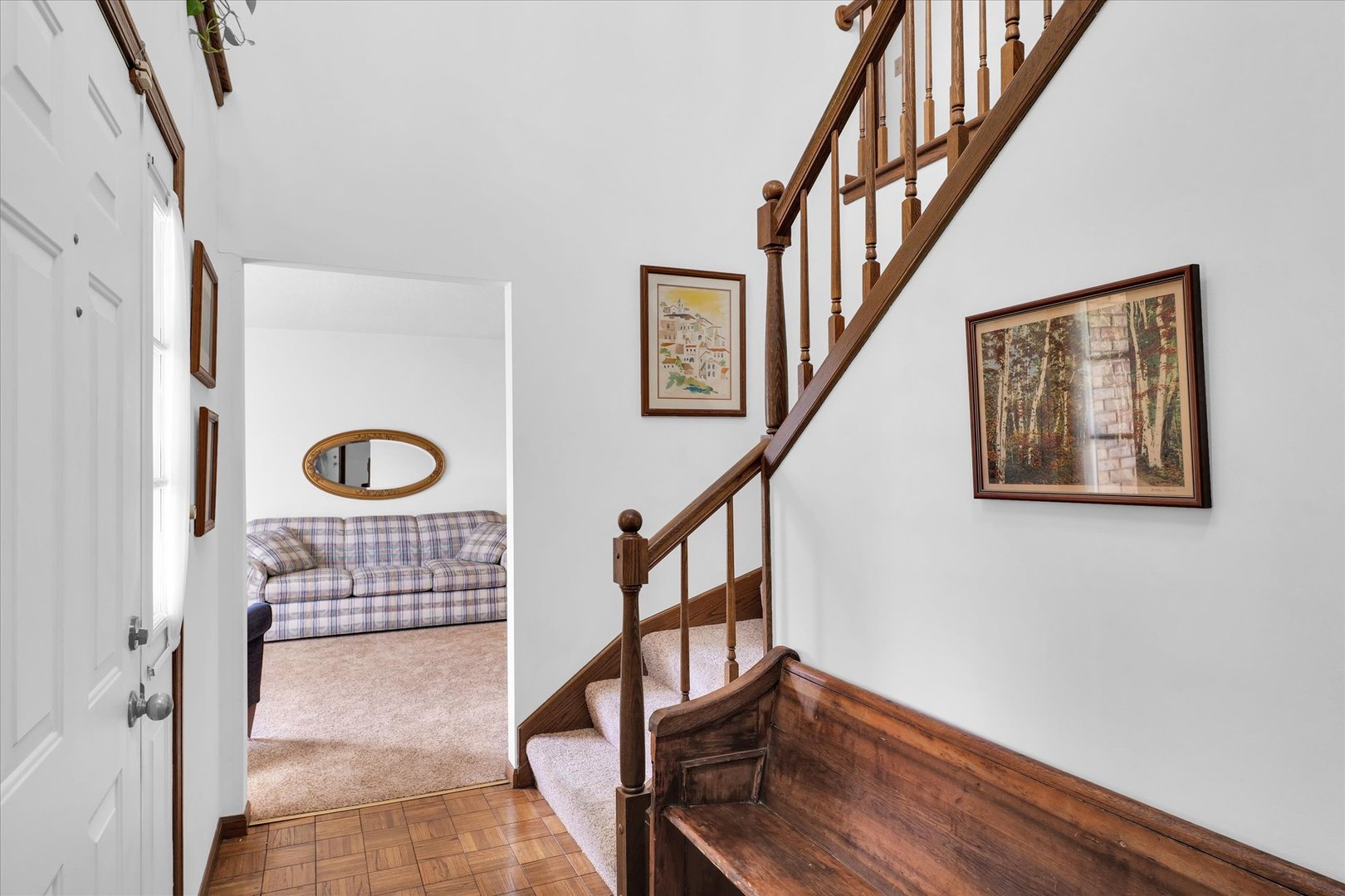 2011 O Donnell Drive Champaign, IL 61821 - Photo 7 of 43 a view of staircase with wooden floor and white walls
