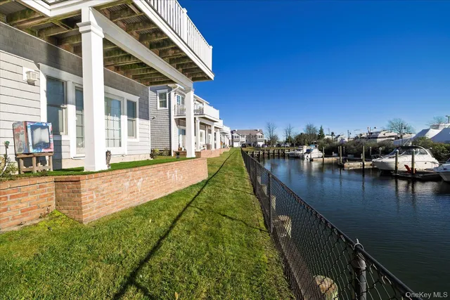 a view of a lake with a yard