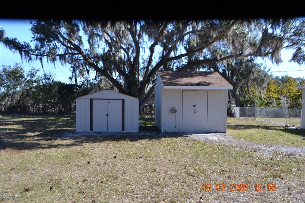 6204 West Knights Griffin Road Plant City, FL 33565 - Photo 16 of 19 a front view of a house with a yard