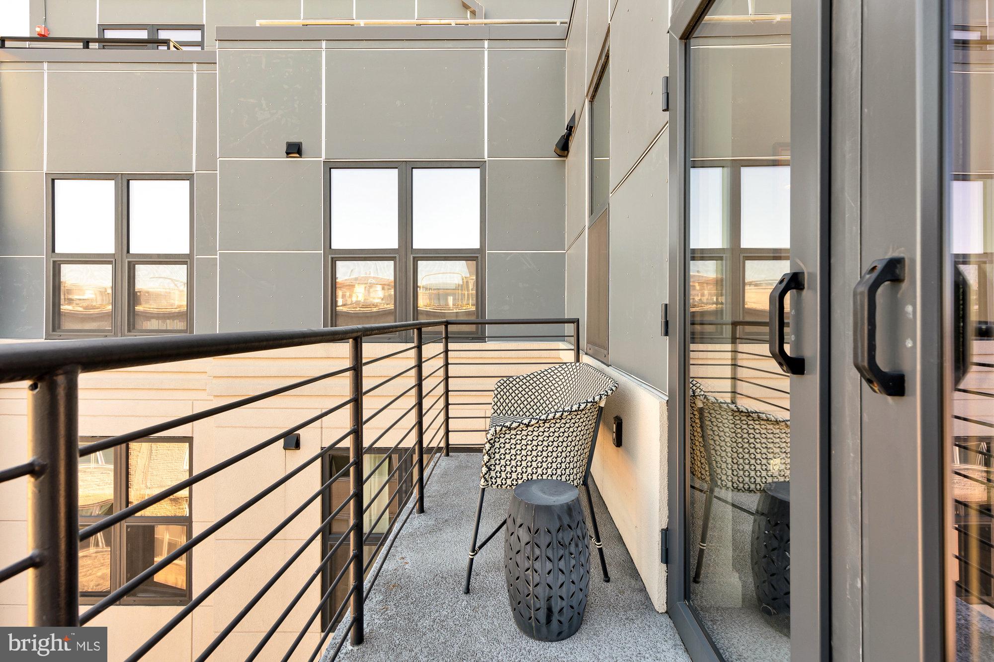 1427 Rhode Island Avenue Northwest, Unit PH01 Washington, DC 20005 - Photo 25 of 39 a view of a bathroom with a tub and windows