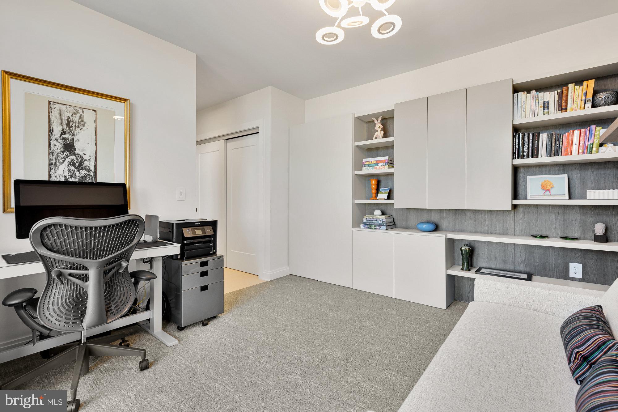 1427 Rhode Island Avenue Northwest, Unit PH01 Washington, DC 20005 - Photo 26 of 39 a view of kitchen with cabinets and window