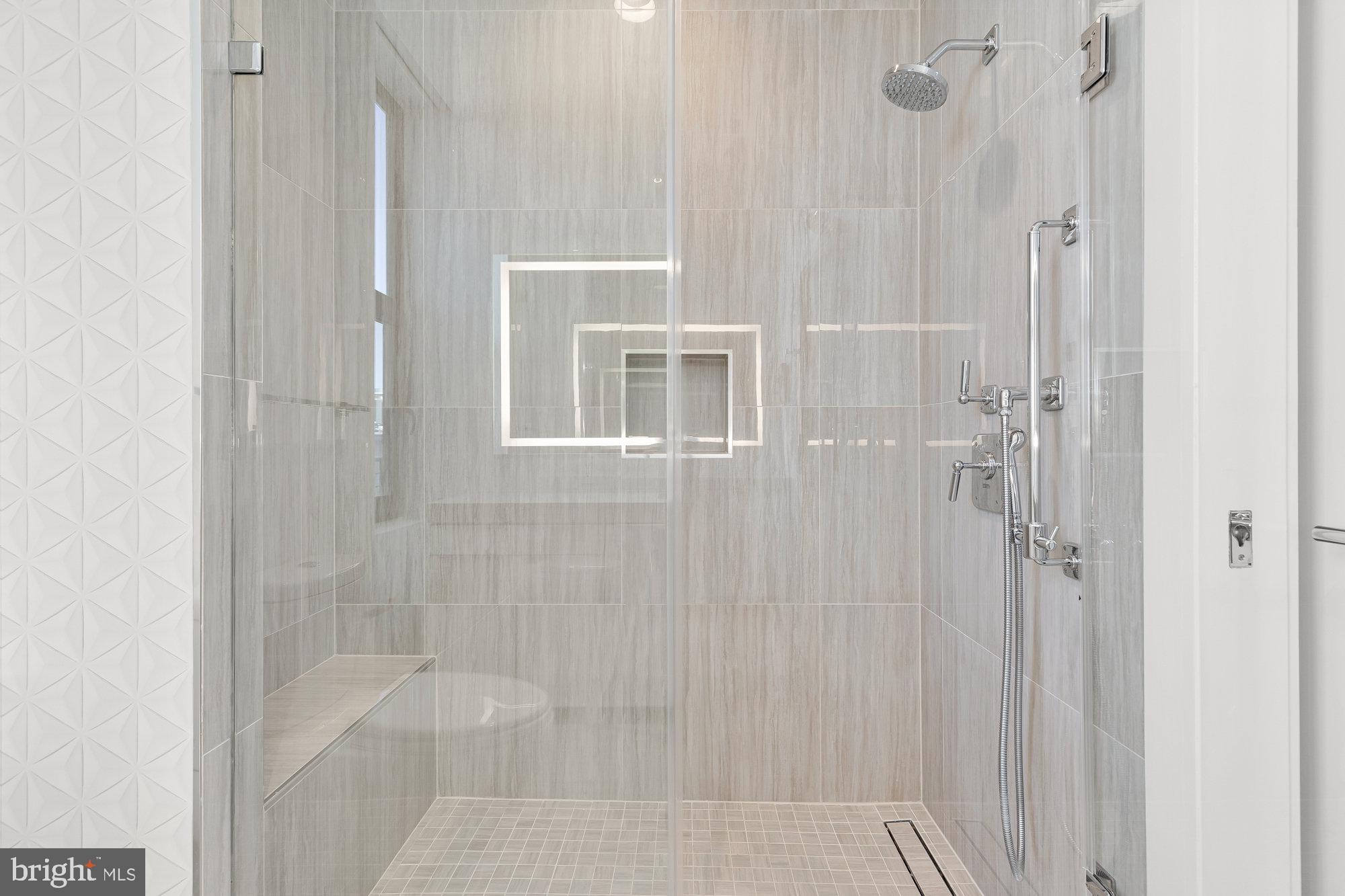 1427 Rhode Island Avenue Northwest, Unit PH01 Washington, DC 20005 - Photo 28 of 39 a bathroom with a shower