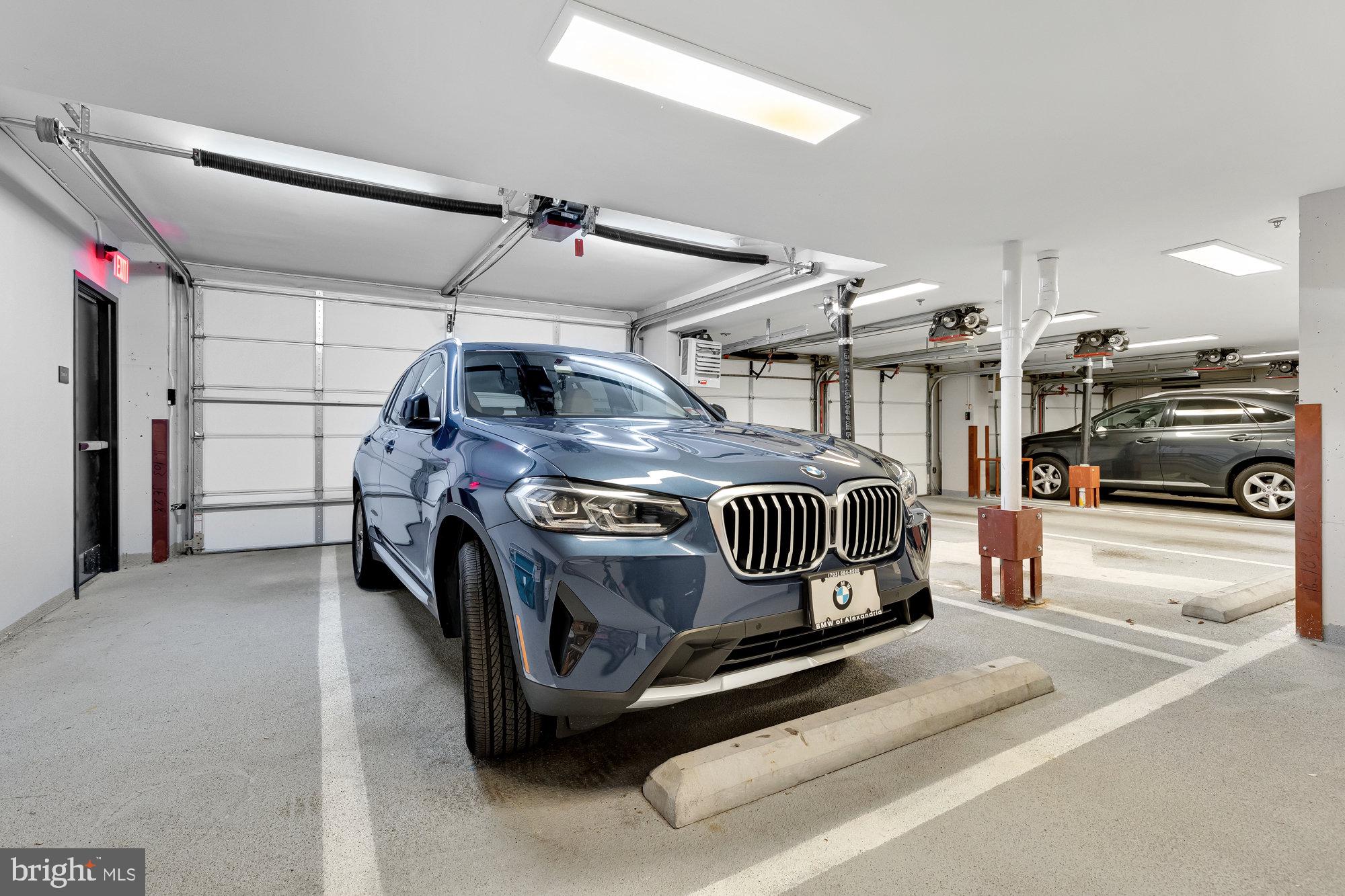 1427 Rhode Island Avenue Northwest, Unit PH01 Washington, DC 20005 - Photo 32 of 39 a bedroom with a bed and a car