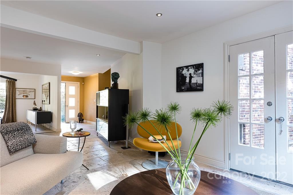 3234 Mountainbrook Road Charlotte, NC 28210 - Photo 11 of 48 a living room with furniture potted plant and a window