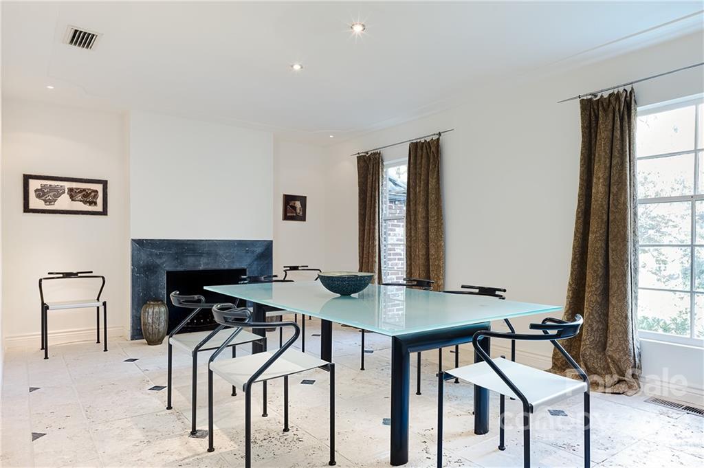 3234 Mountainbrook Road Charlotte, NC 28210 - Photo 13 of 48 a view of a workspace with furniture and window