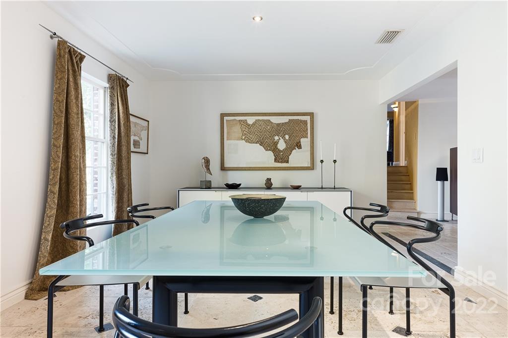 3234 Mountainbrook Road Charlotte, NC 28210 - Photo 14 of 48 a view of a dining room with furniture and a window