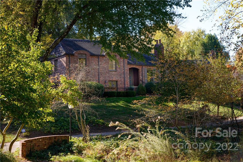 3234 Mountainbrook Road Charlotte, NC 28210 - Photo 2 of 48 a view of a couches in backyard of house