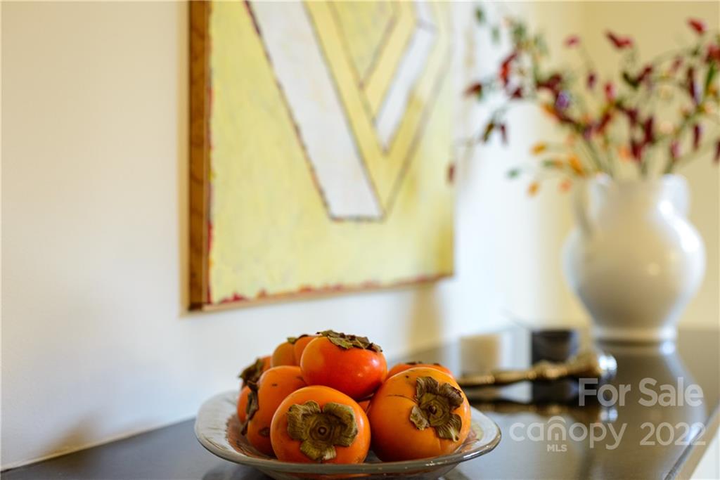 3234 Mountainbrook Road Charlotte, NC 28210 - Photo 22 of 48 a room with a table and a chandelier