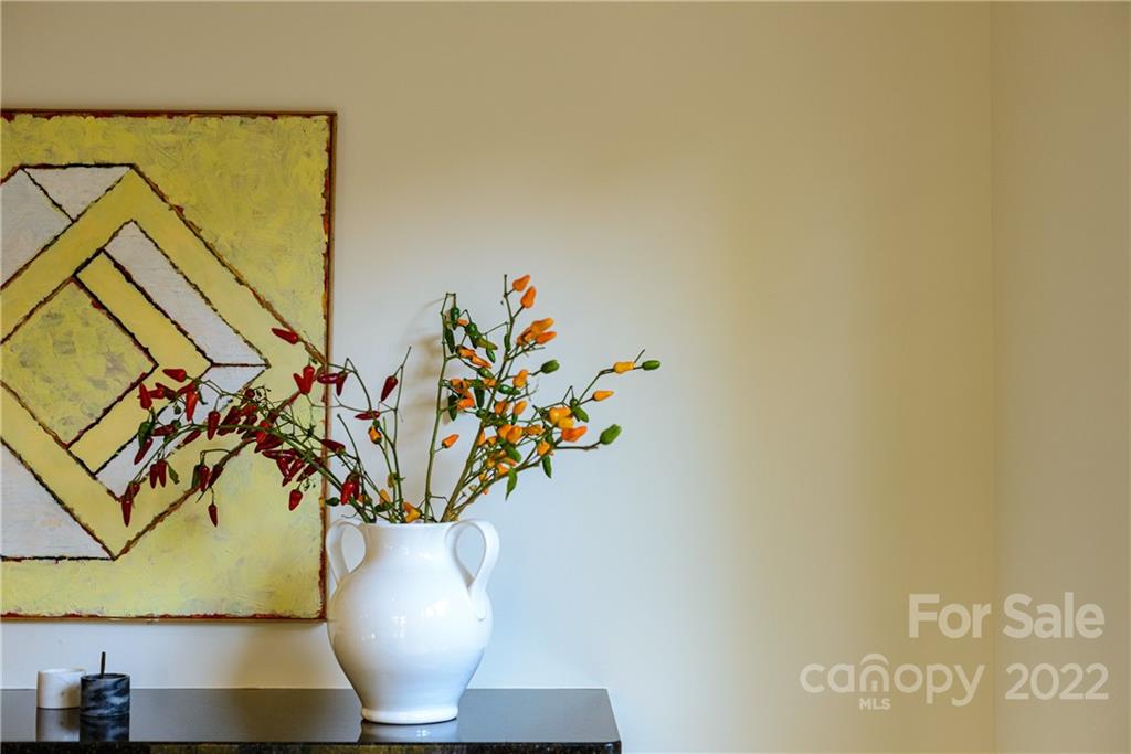 3234 Mountainbrook Road Charlotte, NC 28210 - Photo 23 of 48 a view of a vase of flowers sitting on a table