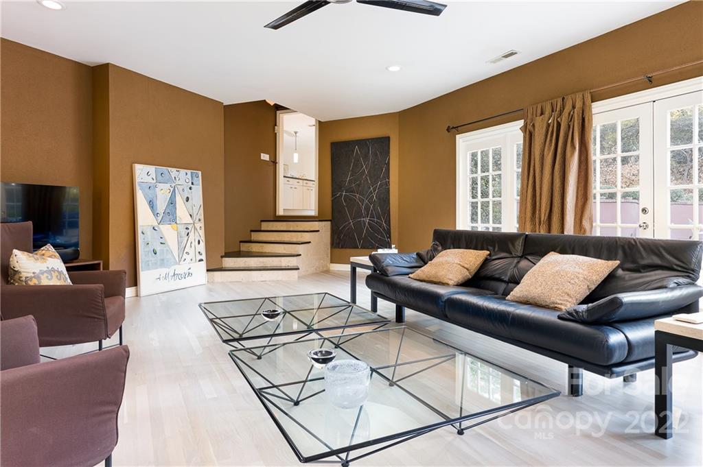 3234 Mountainbrook Road Charlotte, NC 28210 - Photo 25 of 48 a living room with furniture and a large window