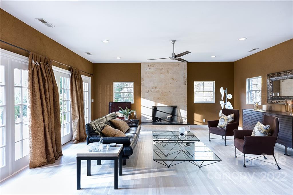 3234 Mountainbrook Road Charlotte, NC 28210 - Photo 26 of 48 a living room with furniture or couch and a fireplace