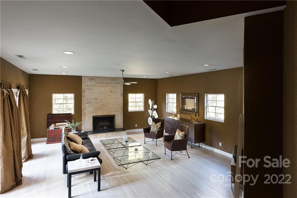 3234 Mountainbrook Road Charlotte, NC 28210 - Photo 27 of 48 a living room with furniture or fireplace and a wooden floor