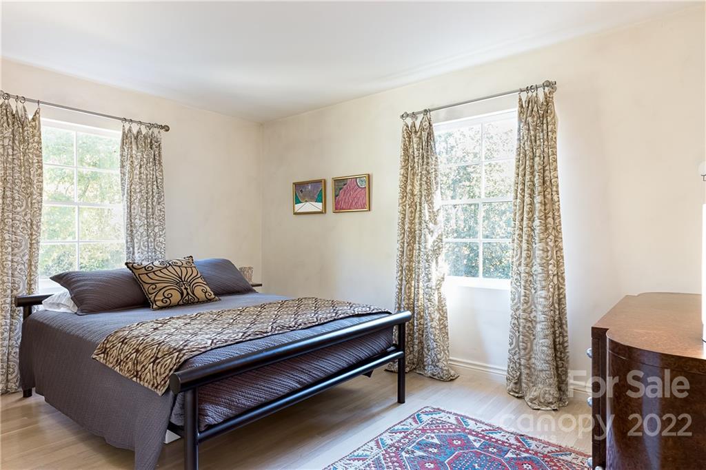 3234 Mountainbrook Road Charlotte, NC 28210 - Photo 36 of 48 a living room with furniture and a window
