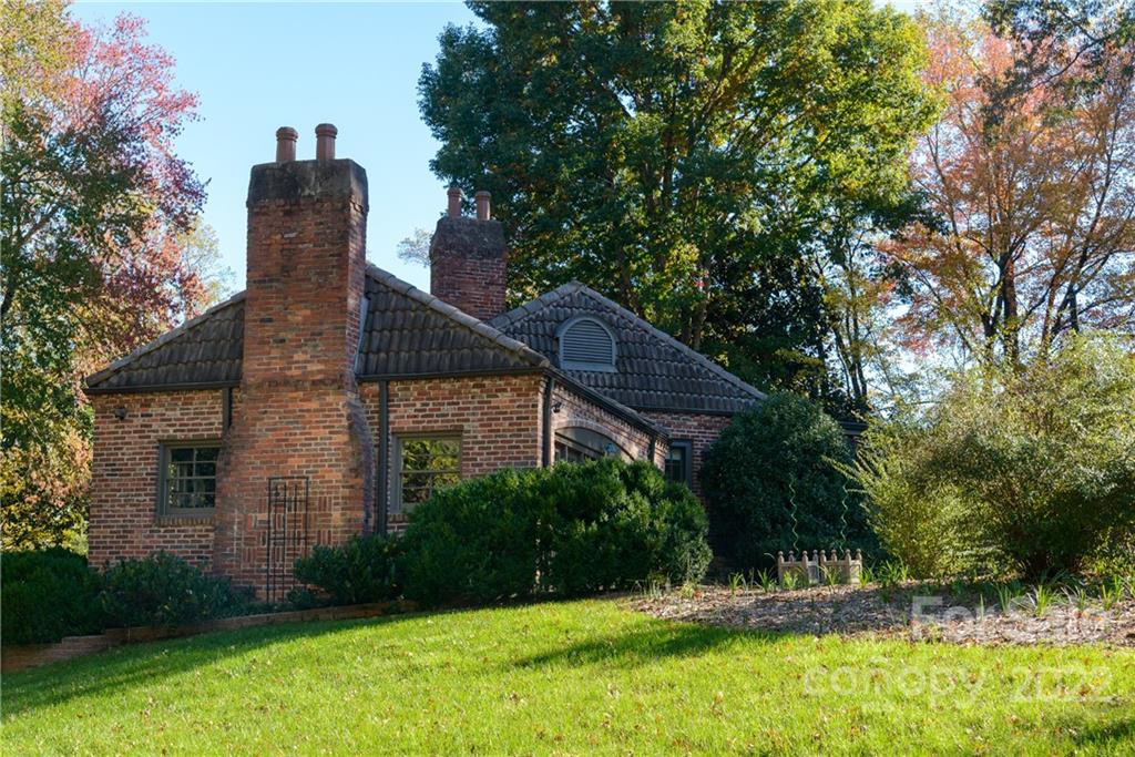 3234 Mountainbrook Road Charlotte, NC 28210 - Photo 45 of 48 a view of a house with a yard