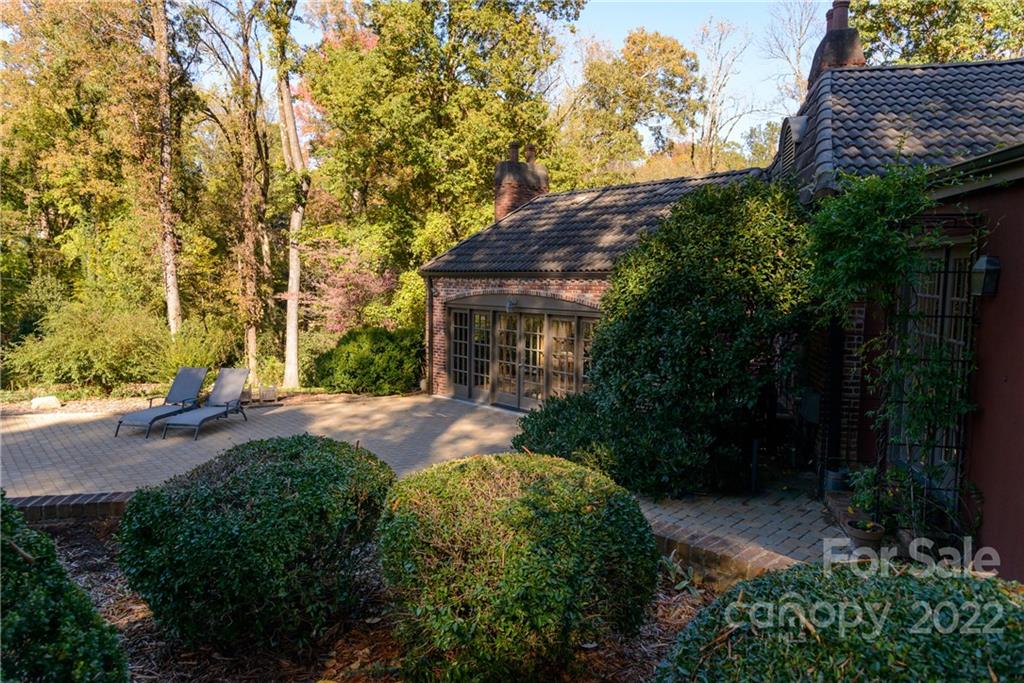 3234 Mountainbrook Road Charlotte, NC 28210 - Photo 48 of 48 a view of a yard with plants and large trees