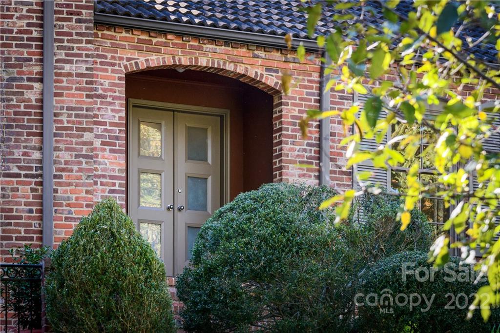 3234 Mountainbrook Road Charlotte, NC 28210 - Photo 6 of 48 a front view of a house with plants