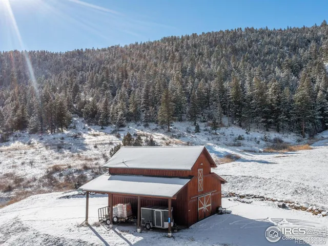 a aerial view of a house with a yard