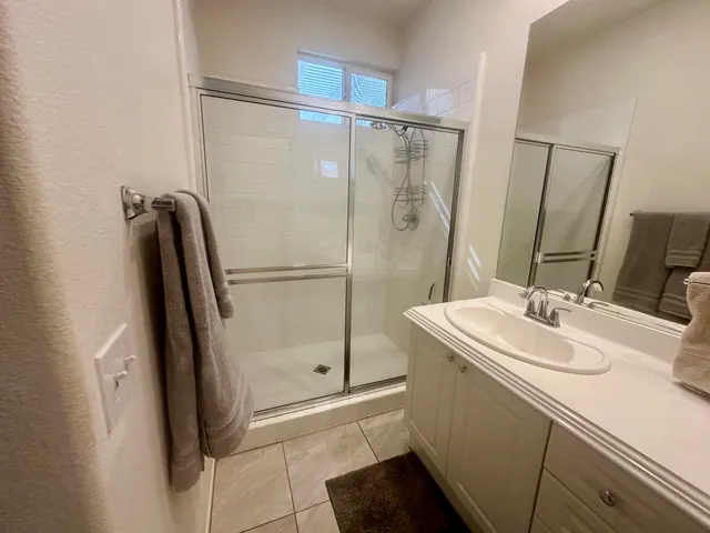 a bathroom with a sink and washing machine