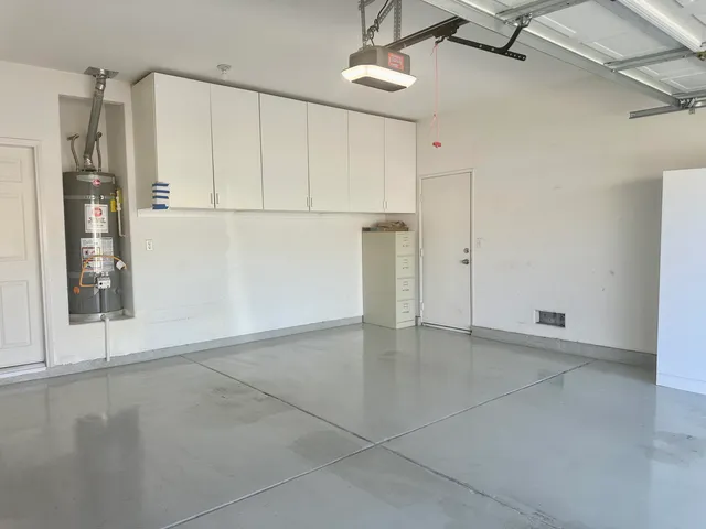 a view of a house with backyard porch and sitting area