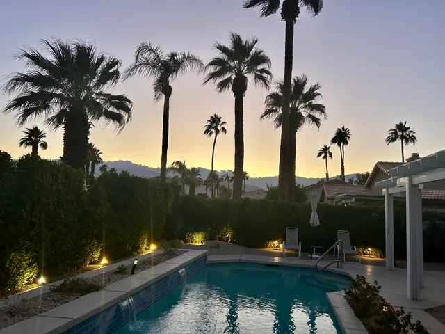 a view of a lake with a house