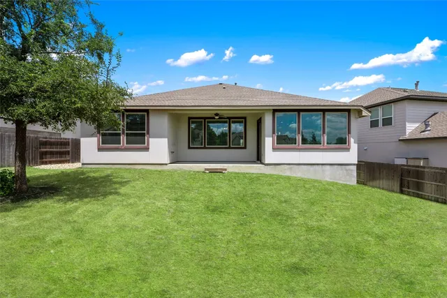 a house view with a garden space