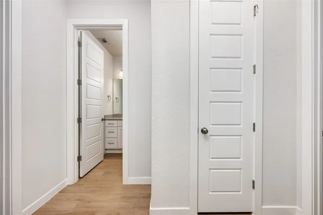 an empty room with closet door