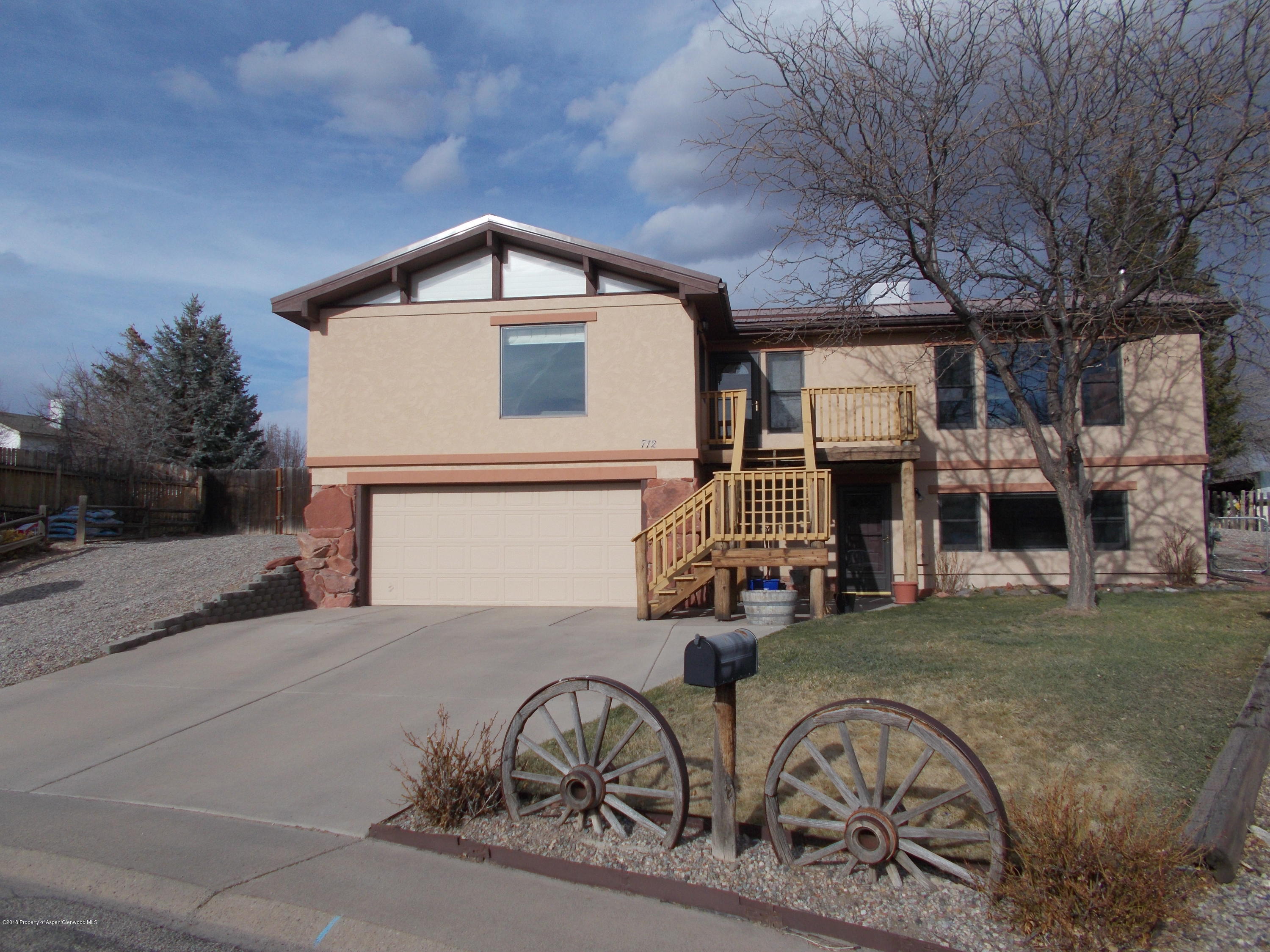 712 Buckeye Court Rifle, CO 81650 - Photo 2 of 22 a view of a house with a patio