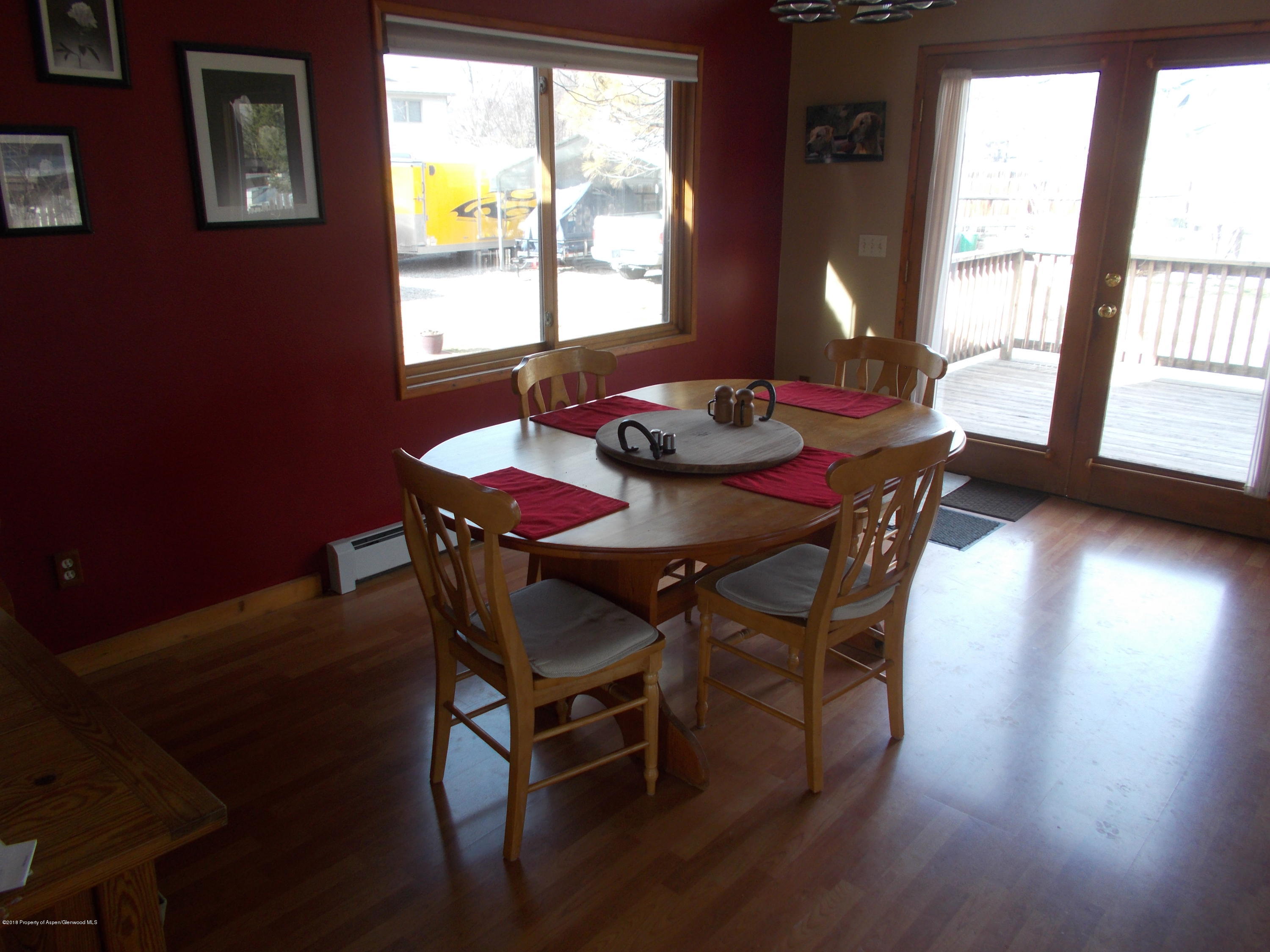 712 Buckeye Court Rifle, CO 81650 - Photo 9 of 22 a dining room with furniture and window