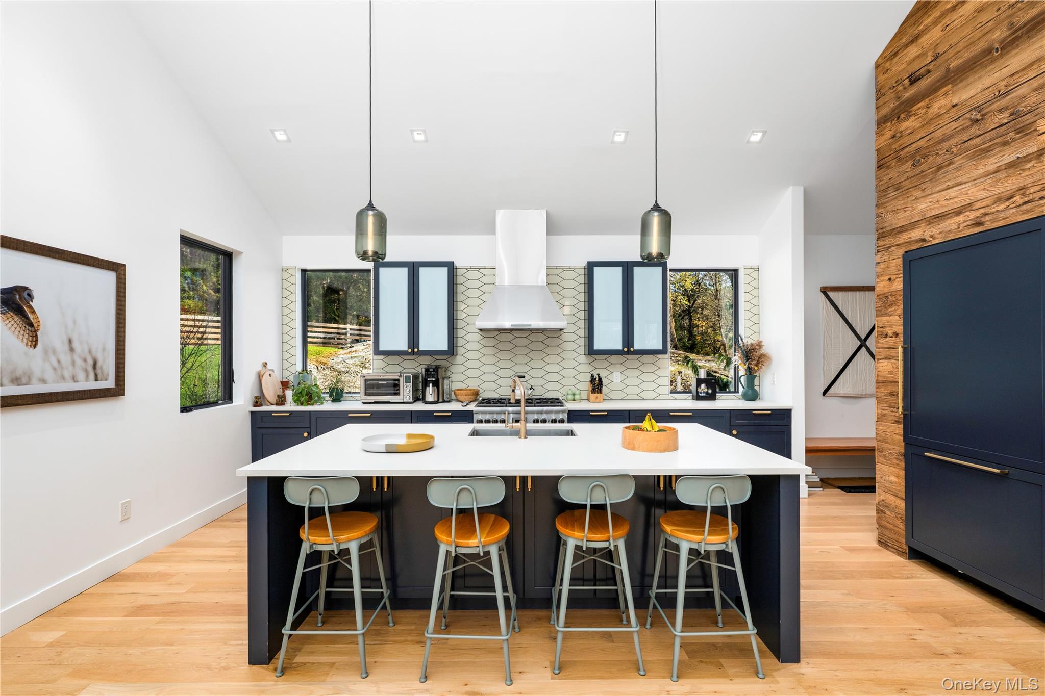 67 Dean Road Carmel, NY 10512 - Photo 11 of 29 Kitchen island featuring a wall of storage.