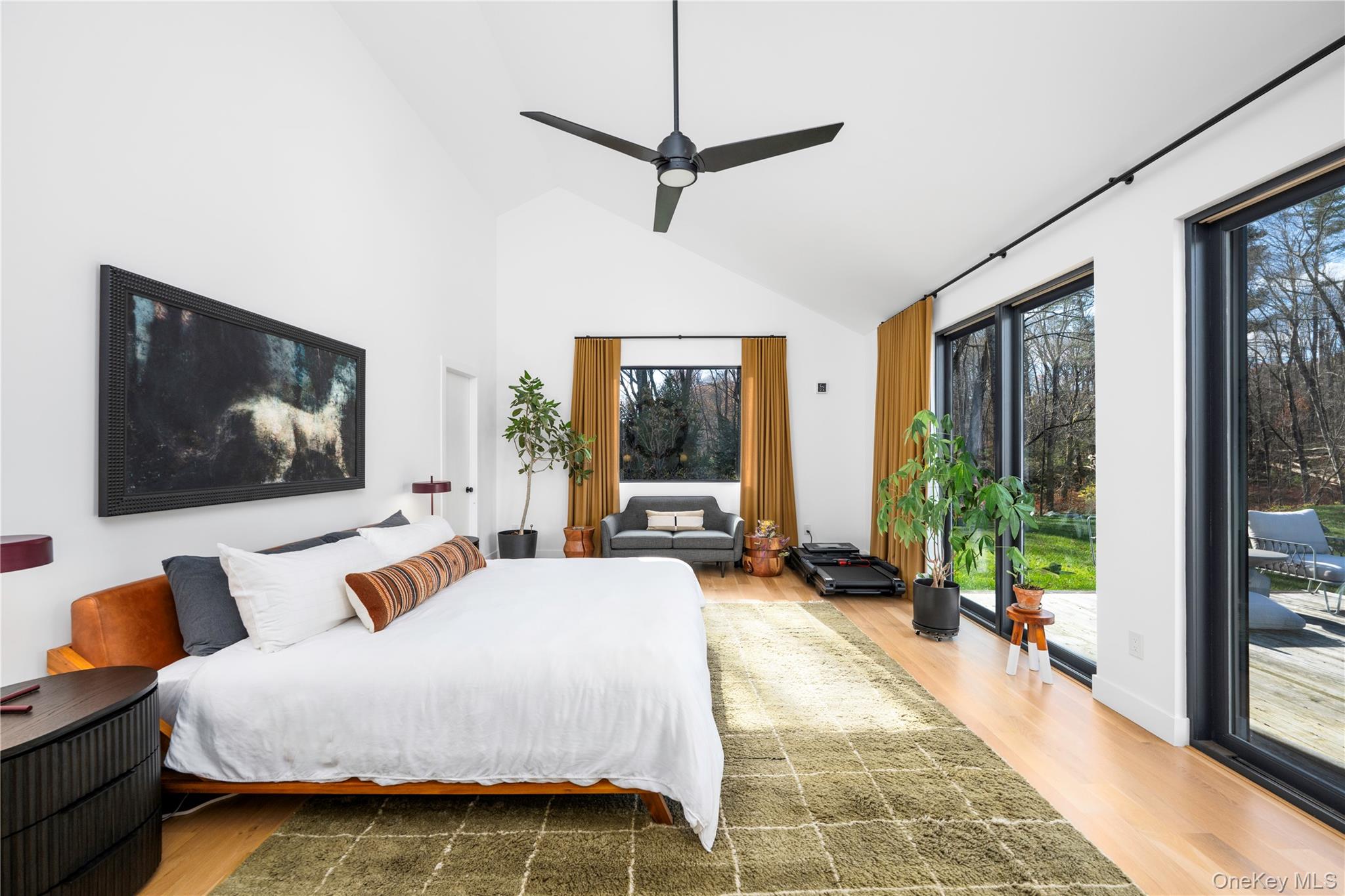 67 Dean Road Carmel, NY 10512 - Photo 17 of 29 Primary Bedroom with wall of windows providing access to the deck.