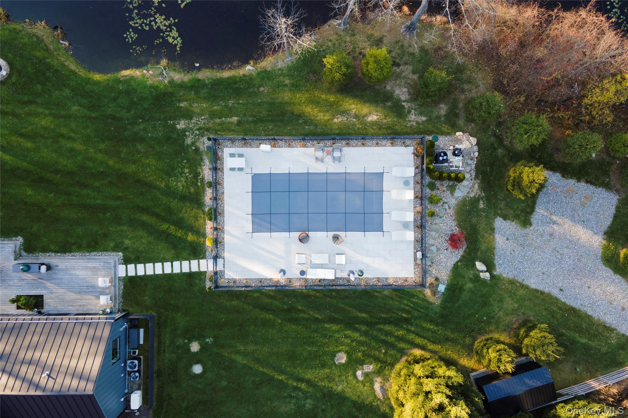 67 Dean Road Carmel, NY 10512 - Photo 25 of 29 Aerial view of pond, pool and back deck and yard.