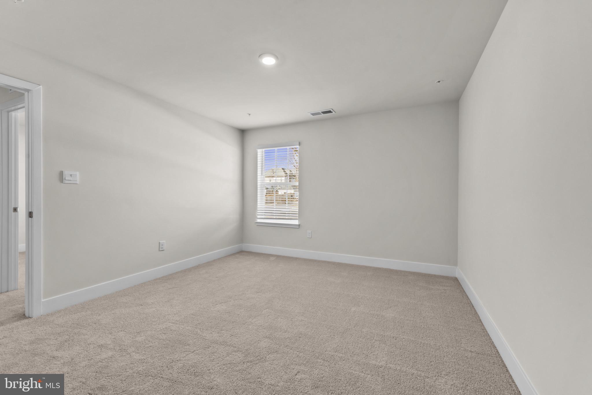 224 Eclipse Street Ranson, WV 25438 - Photo 22 of 41 a view of an empty room with a window