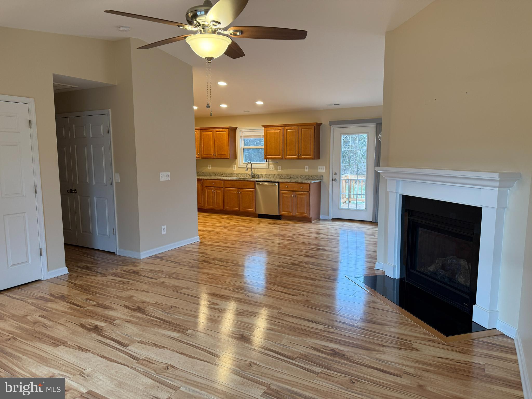 3385 Howellsville Road Front Royal, VA 22630 - Photo 4 of 19 a view of a livingroom with kitchen and fireplace