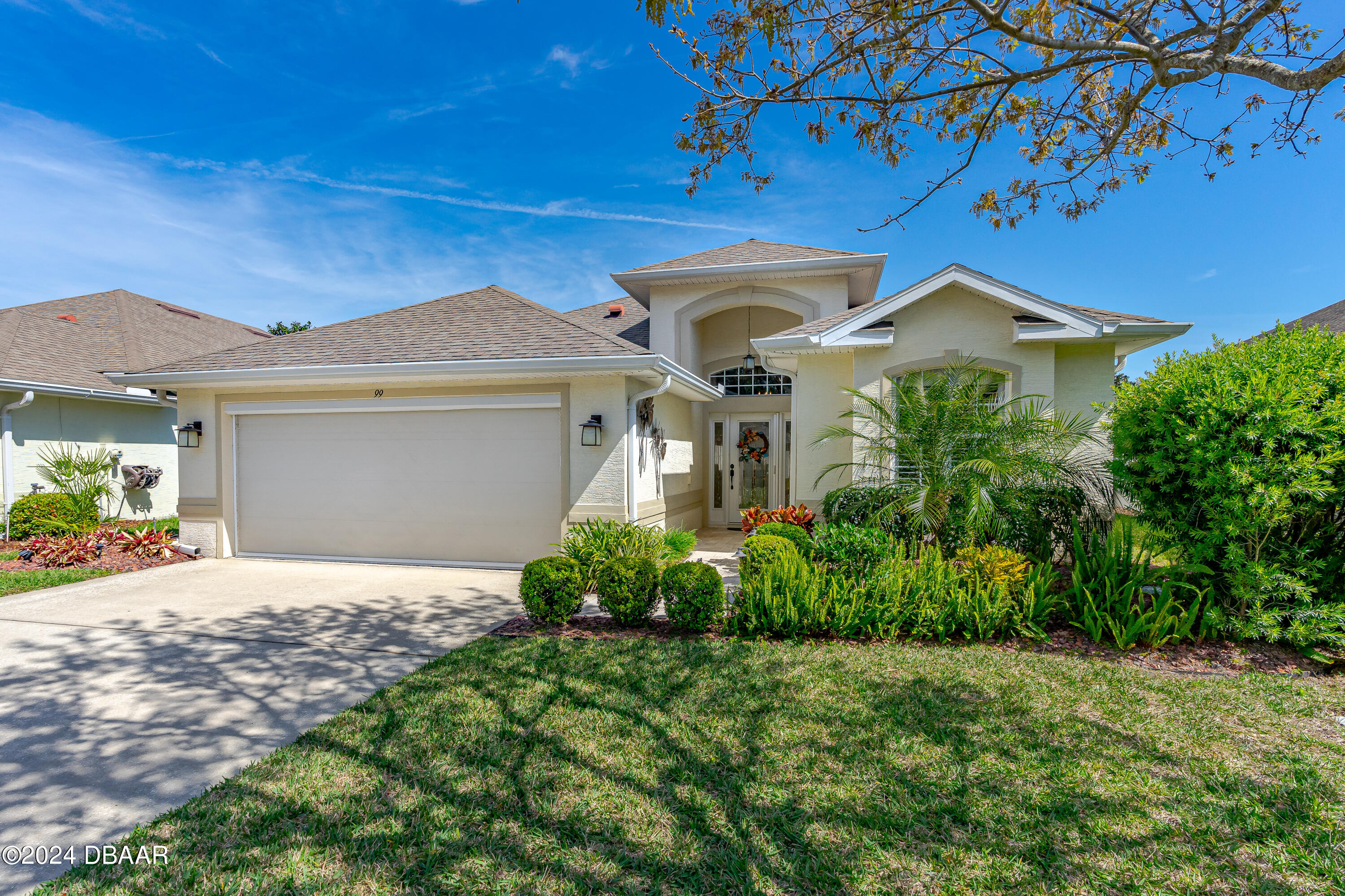 99 Raintree Circle Palm Coast, FL 32164 - Photo 1 of 47 Front of home