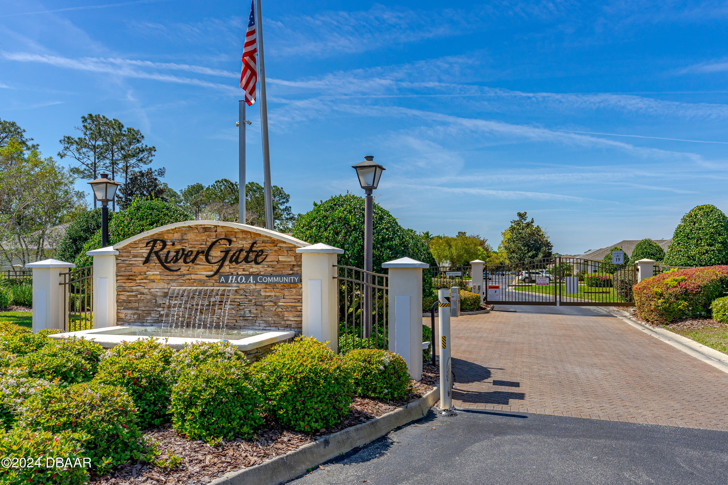 99 Raintree Circle Palm Coast, FL 32164 - Photo 3 of 47 RiverGate Gated entrance