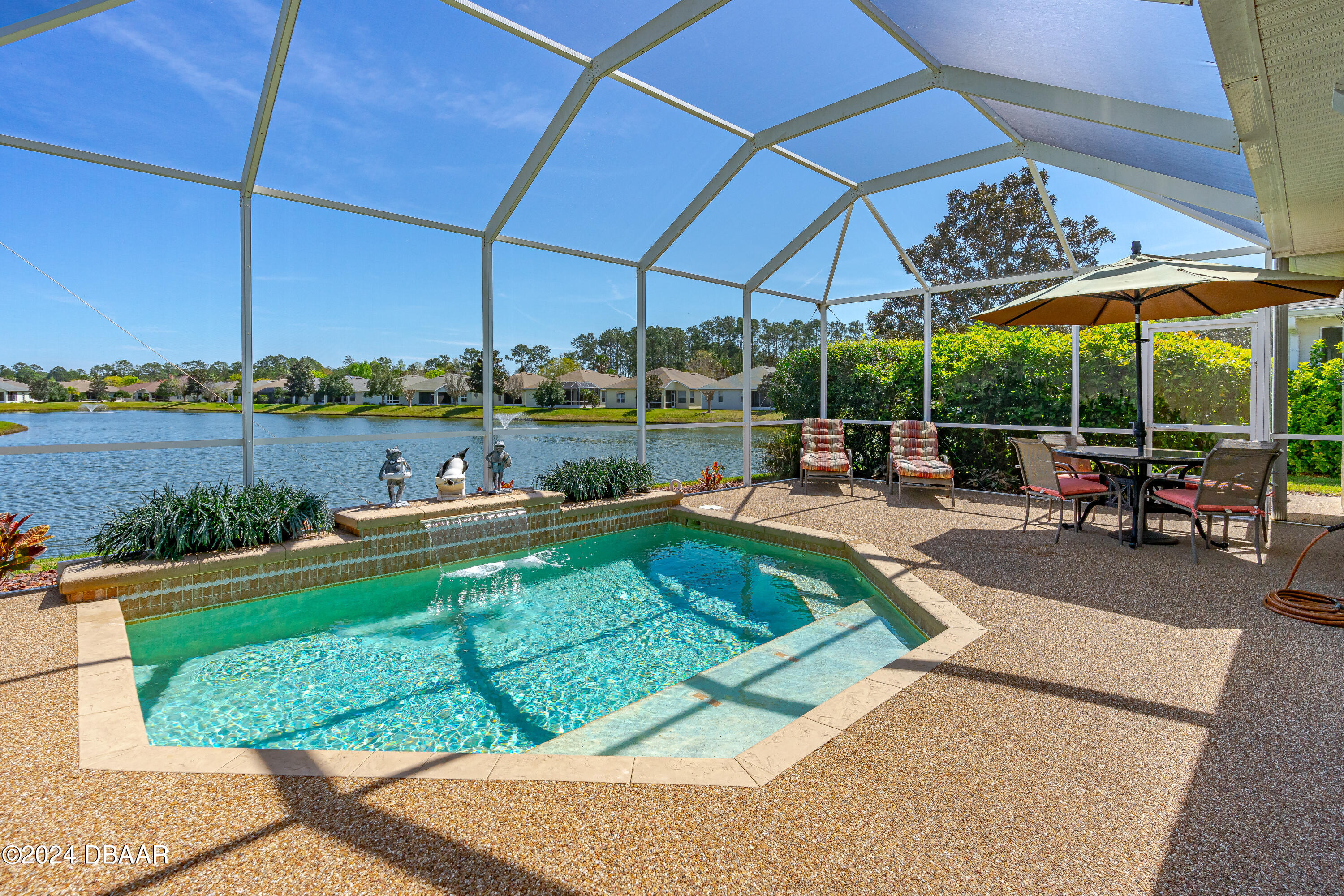 99 Raintree Circle Palm Coast, FL 32164 - Photo 33 of 47 Spacious pool patio with lanai