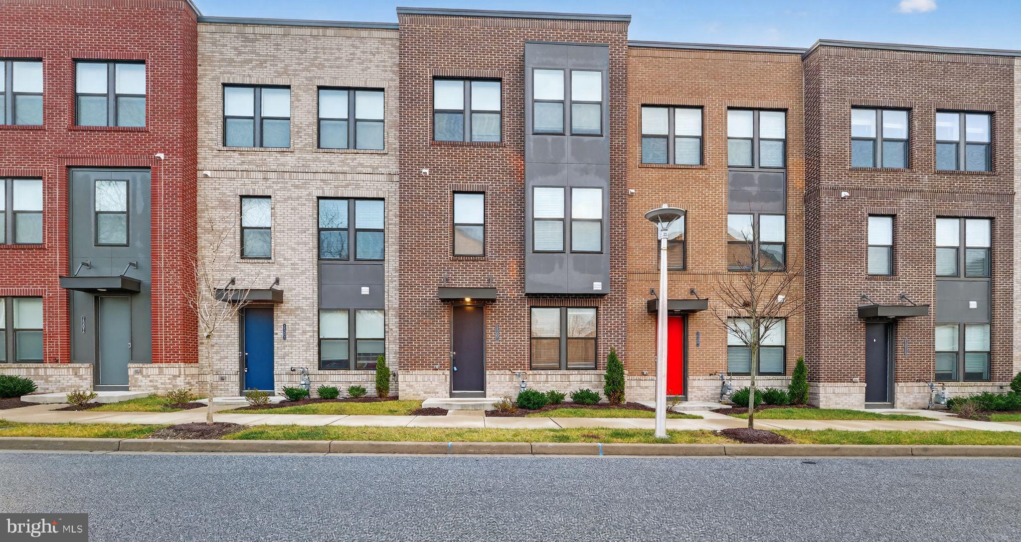 1505 Roland Heights Avenue Baltimore, MD 21211 - Photo 1 of 36 a front view of multi story residential apartment building