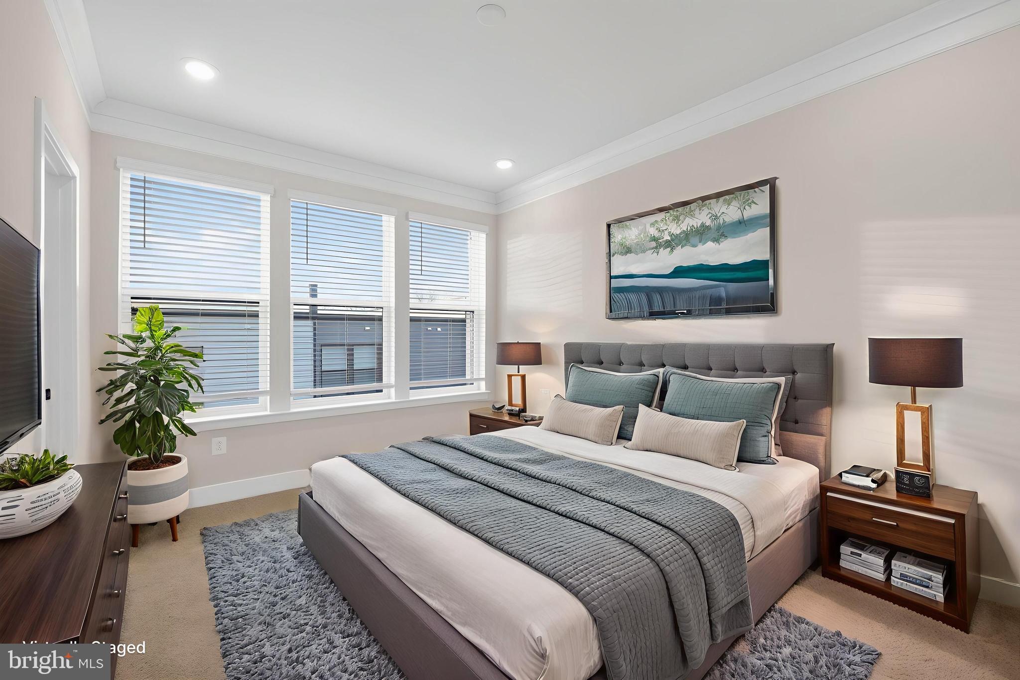 1505 Roland Heights Avenue Baltimore, MD 21211 - Photo 25 of 36 a bedroom with bed and a large window