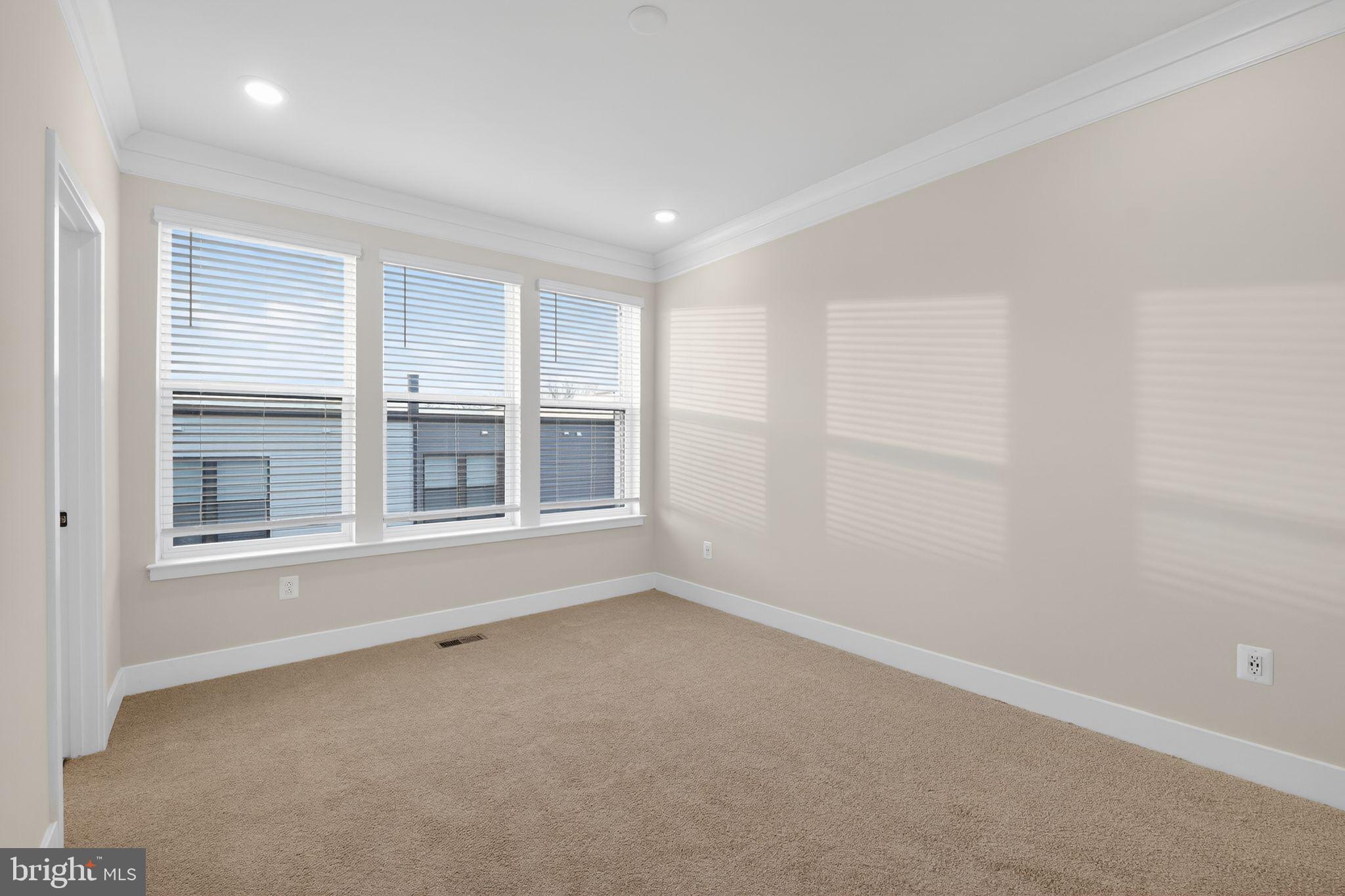 1505 Roland Heights Avenue Baltimore, MD 21211 - Photo 26 of 36 an empty room with a window