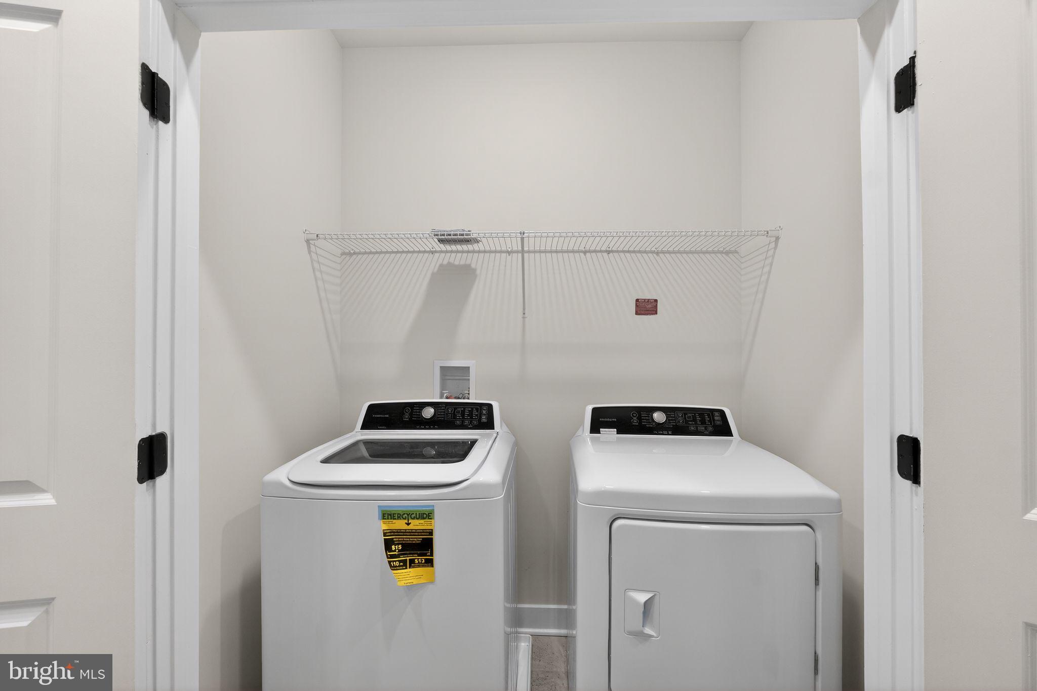 1505 Roland Heights Avenue Baltimore, MD 21211 - Photo 32 of 36 a room with storage and utility