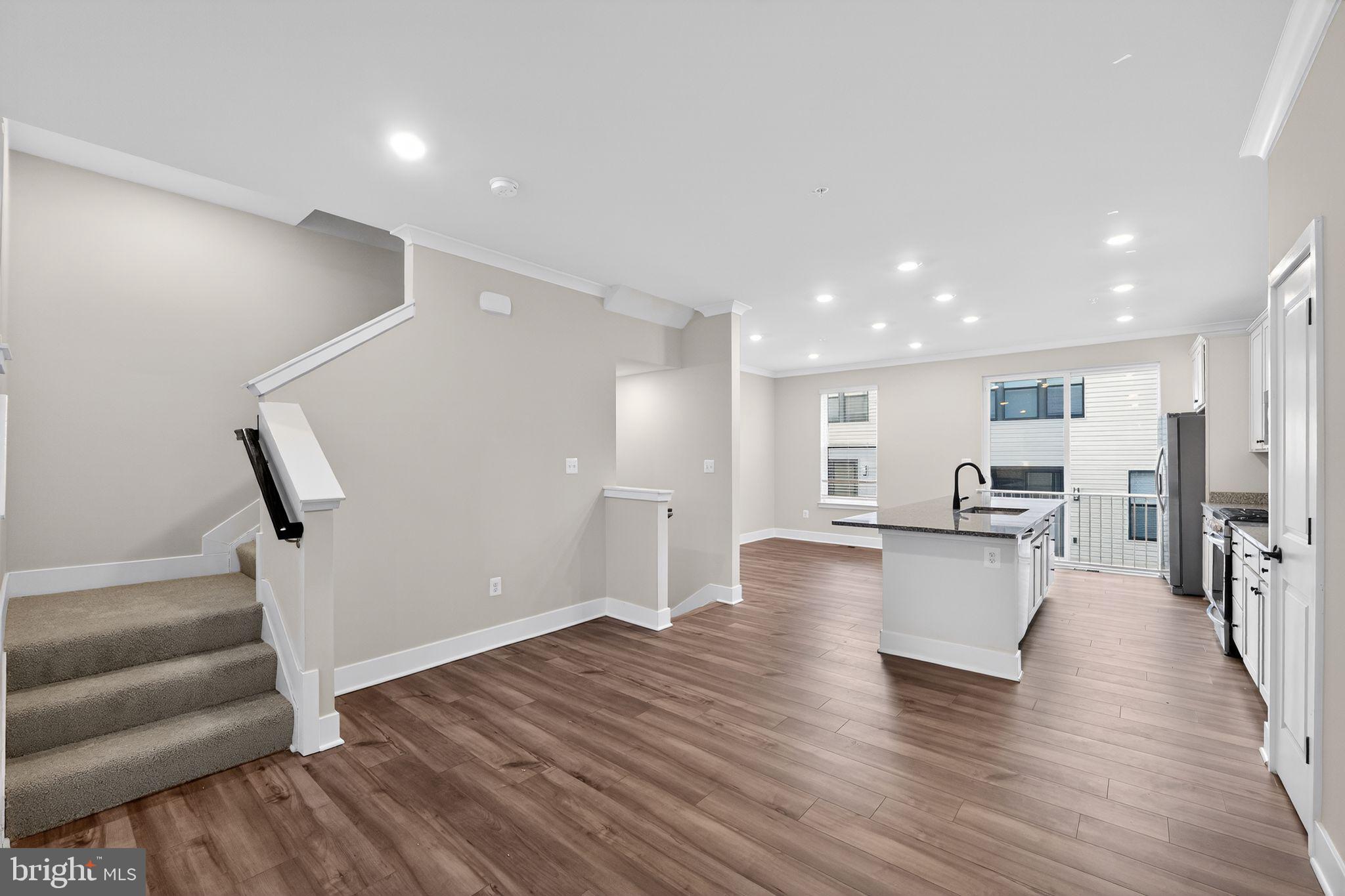 1505 Roland Heights Avenue Baltimore, MD 21211 - Photo 10 of 36 a view of kitchen with furniture and wooden floor