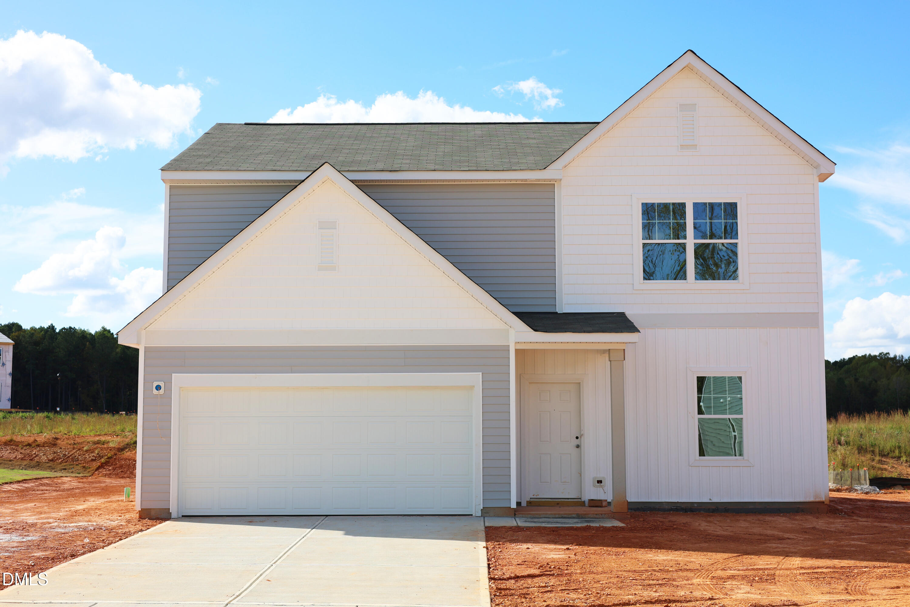 a view of front of house with a garage