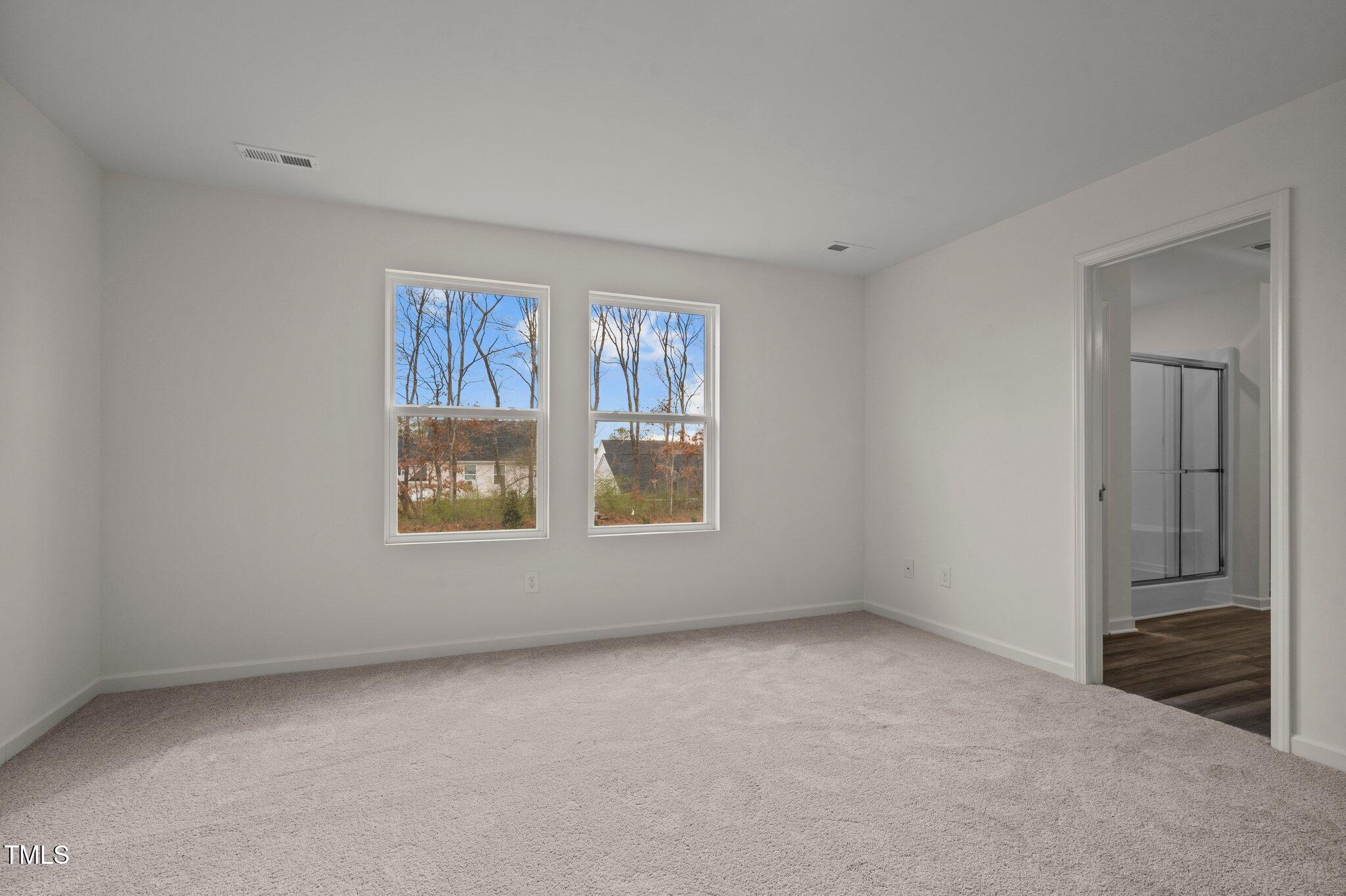 890 Embraer Way Spring Hope, NC 27882 - Photo 27 of 41 an empty room with a window