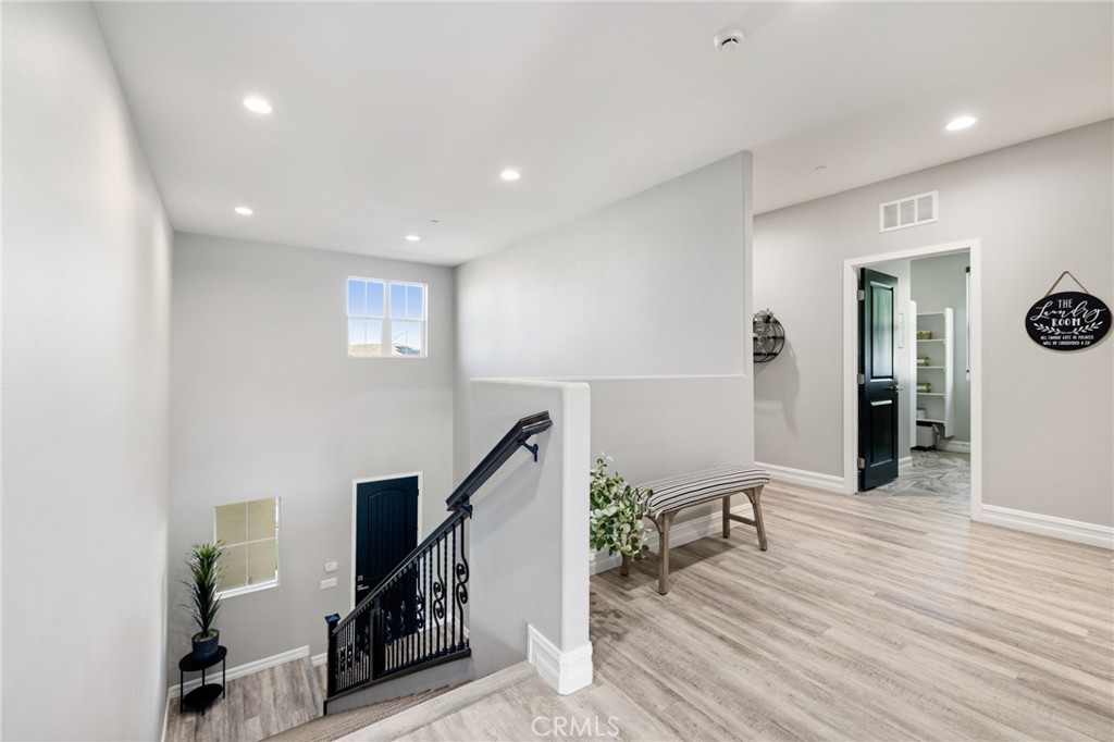 25313 High Noon Court Menifee, CA 92584 - Photo 35 of 73 a view of entryway with livingroom and furniture