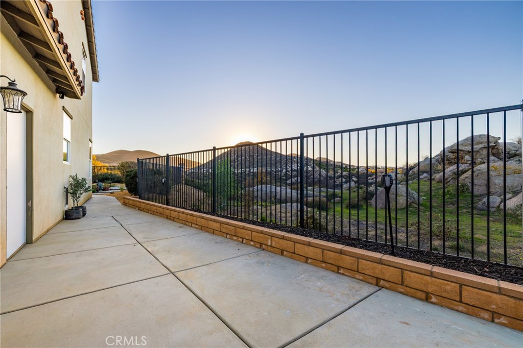 25313 High Noon Court Menifee, CA 92584 - Photo 58 of 73 a view of balcony with floor to ceiling window