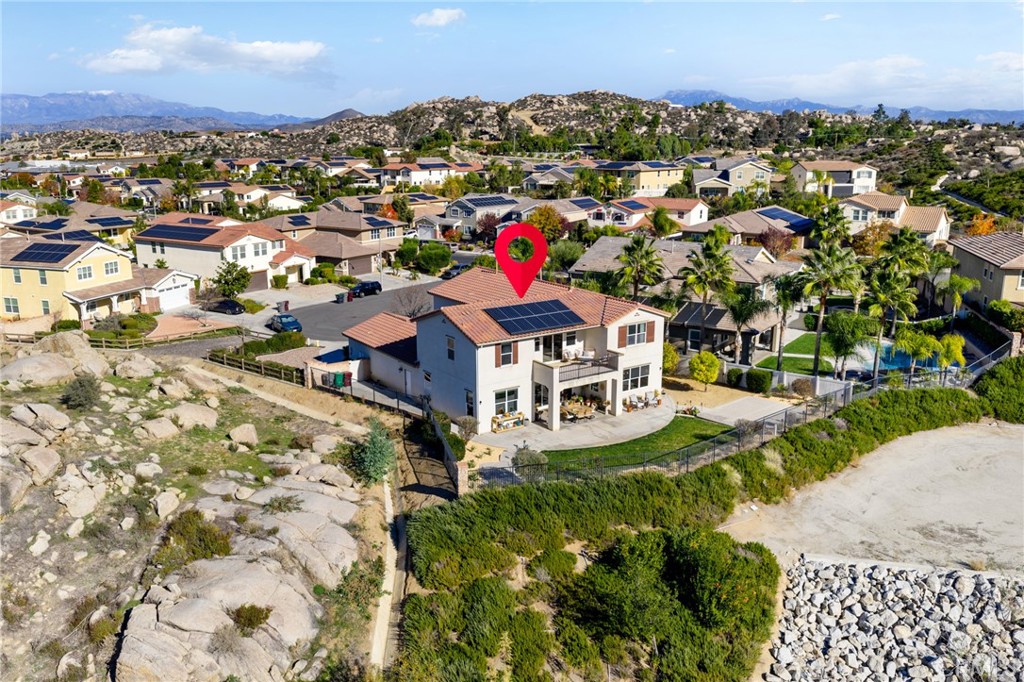 25313 High Noon Court Menifee, CA 92584 - Photo 61 of 73 an aerial view of residential houses with outdoor space and trees