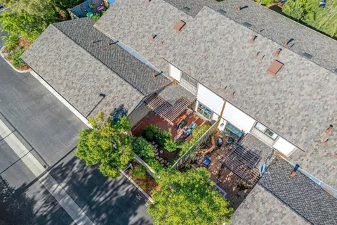 a view of a house with a outdoor space and a street